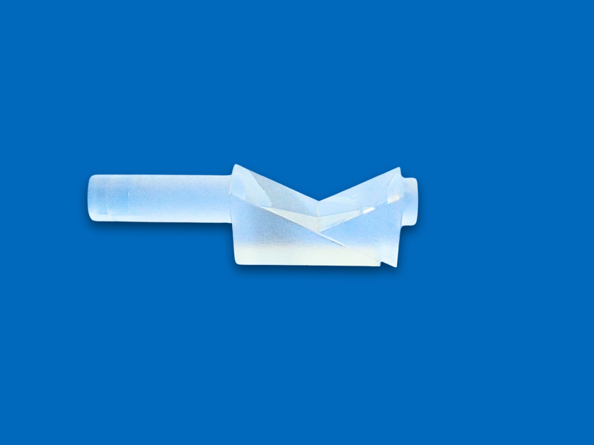 A prism inverter short component, typically used in rigid endoscopes, against a blue background.